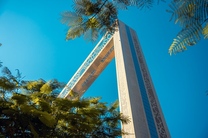 Experience the stunning juxtaposition of old and new Dubai from the iconic Dubai Frame where history meets modernity in an unforgettable skyline view. Perfect for travelers seeking a unique perspective.